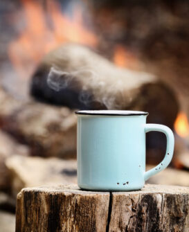Enjoy a cup of hot cocoa over the campfire - Whitecourt Lions Campground